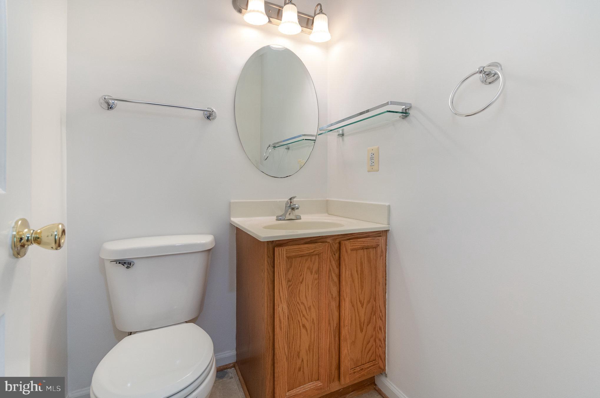 2968 Emerald Chase Drive Herndon, VA 20171 - Photo 16 of 29 a bathroom with a toilet sink and shower