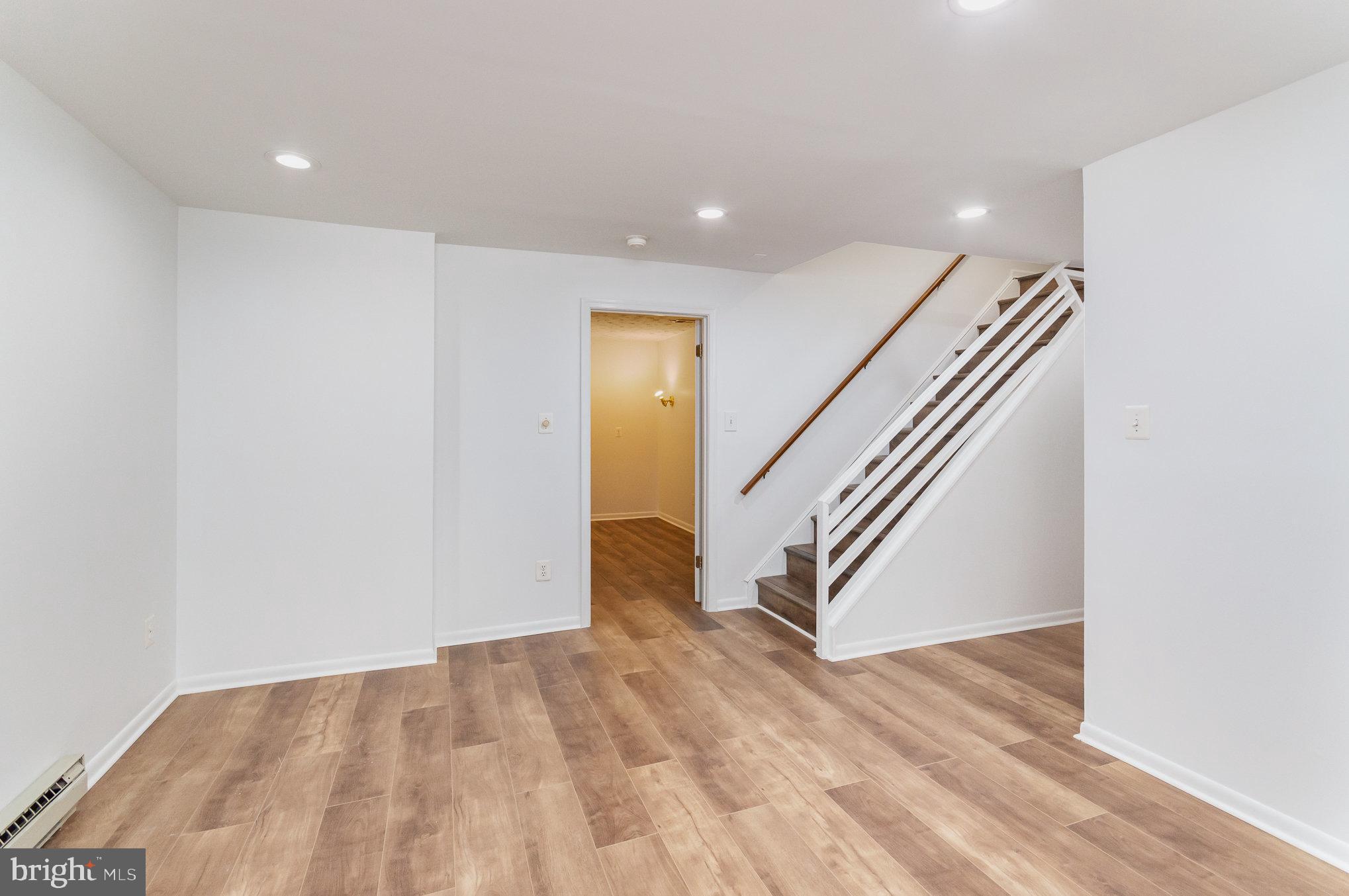 2968 Emerald Chase Drive Herndon, VA 20171 - Photo 24 of 29 a view of an entryway with wooden floor