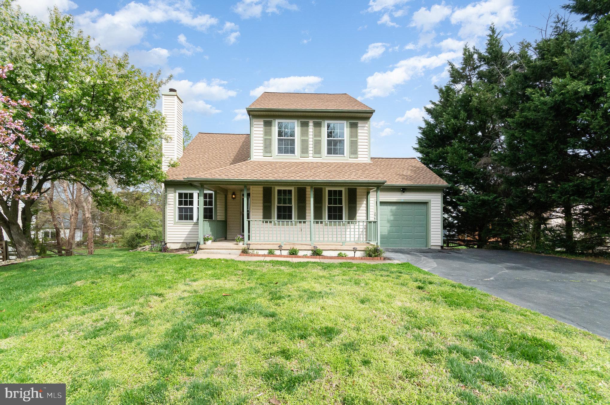 2968 Emerald Chase Drive Herndon, VA 20171 - Photo 3 of 29 a front view of a house with a yard