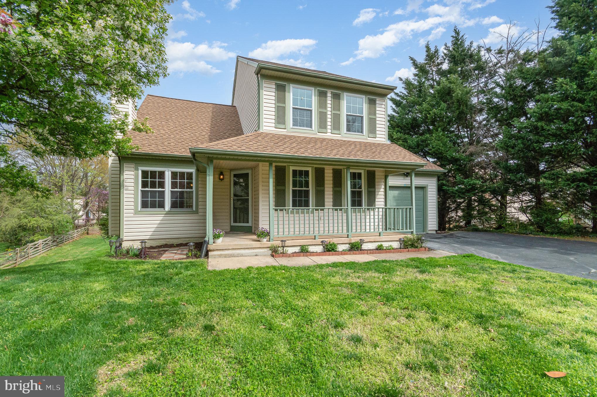 2968 Emerald Chase Drive Herndon, VA 20171 - Photo 4 of 29 front view of a house with a yard