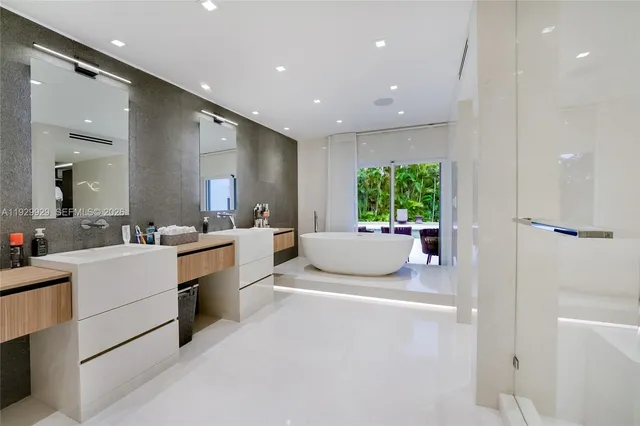 a bedroom with bed and a night stand