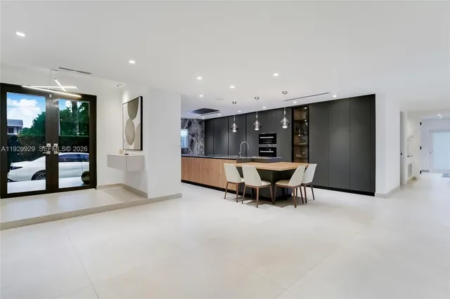 a workspace with furniture and window