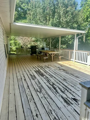 a view of swimming pool from a balcony