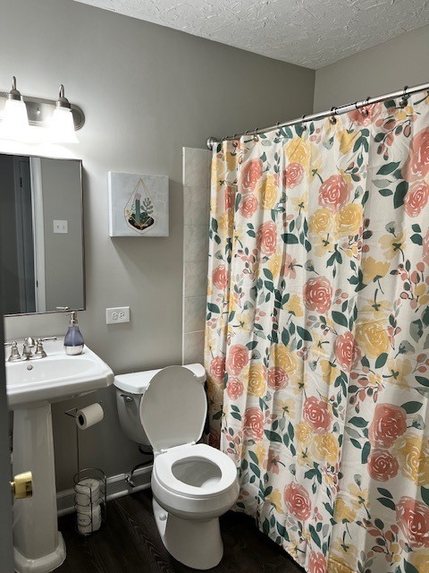 17 Wildwood Road Elk Grove Village, IL 60007 - Photo 11 of 11 a bathroom with a toilet and a sink
