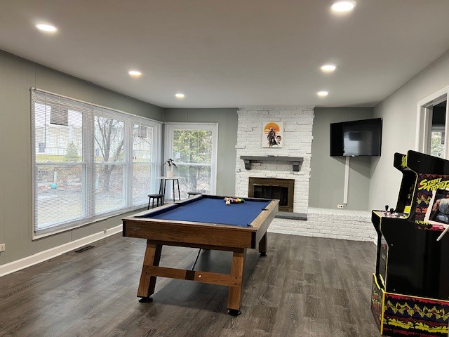 17 Wildwood Road Elk Grove Village, IL 60007 - Photo 5 of 11 a living room with furniture a flat screen tv and a fireplace