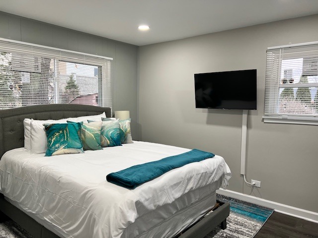 17 Wildwood Road Elk Grove Village, IL 60007 - Photo 9 of 11 a bedroom with a bed and a flat screen tv