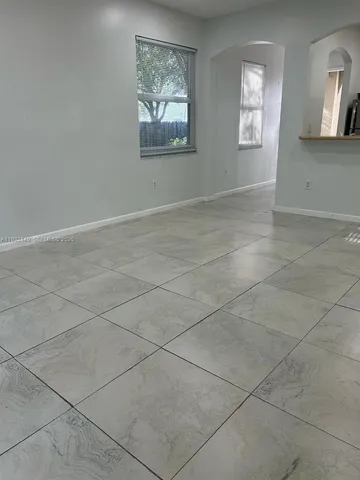 a view of backyard with green space