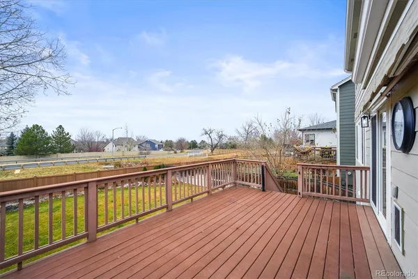 a view of roof deck with patio