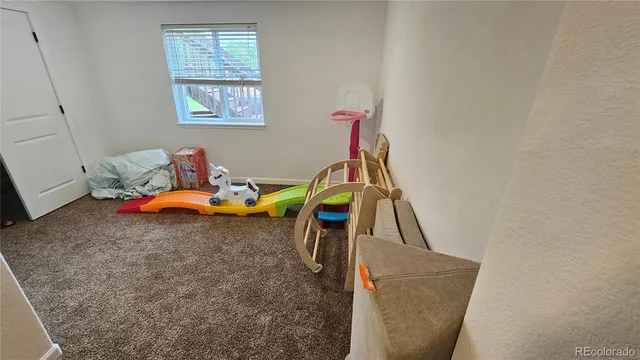 a view of a room with furniture