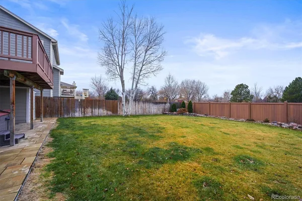 a view of backyard with green space