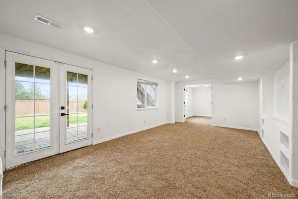 an empty room with windows