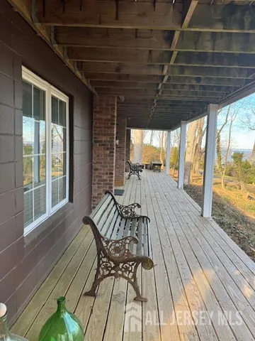 a view of a tree in the middle of a yard