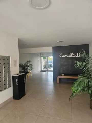 a view of a livingroom with furniture and window
