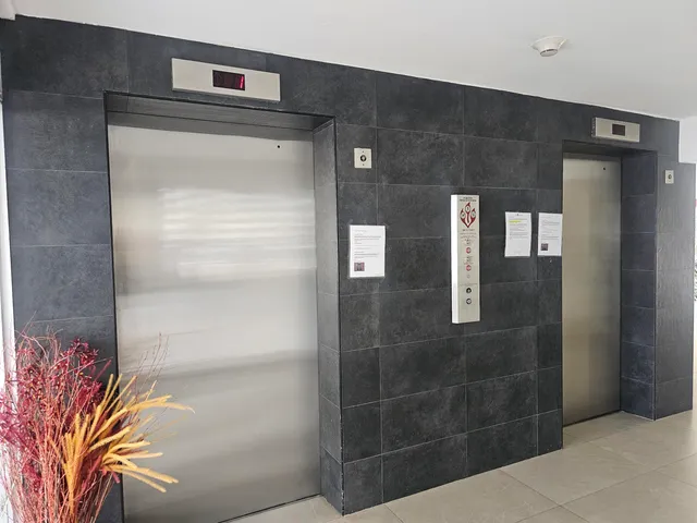 a kitchen with granite countertop a sink and a stove top oven