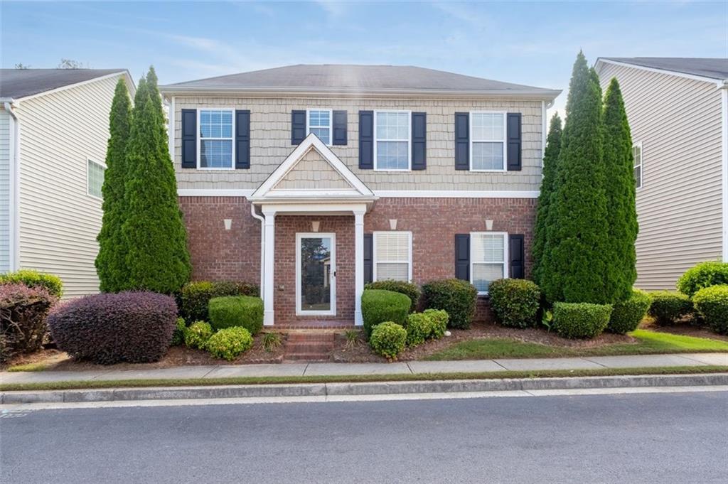 3272 Tiara Circle Southwest Atlanta, GA 30311 - Photo 1 of 1 front view of a house with a yard