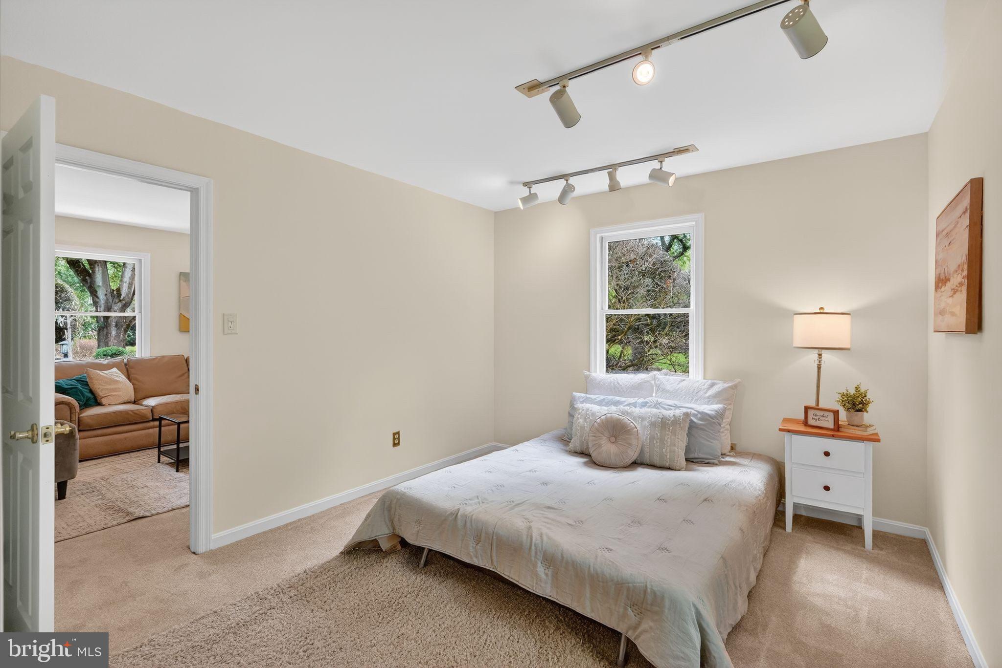 13821 Esworthy Road Darnestown, MD 20874 - Photo 30 of 98 a bedroom with a bed and window