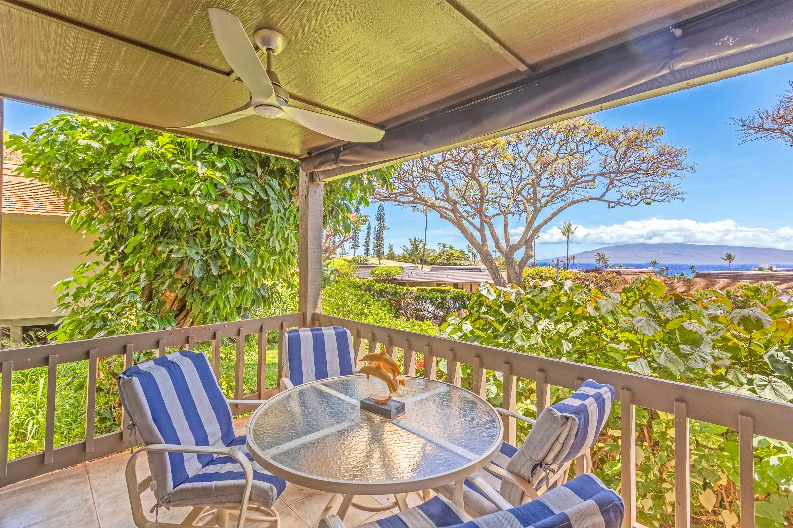 150 Puukolii Road, Unit 18 Lahaina, HI 96761 - Photo 44 of 49 a view of a chairs and table in the patio