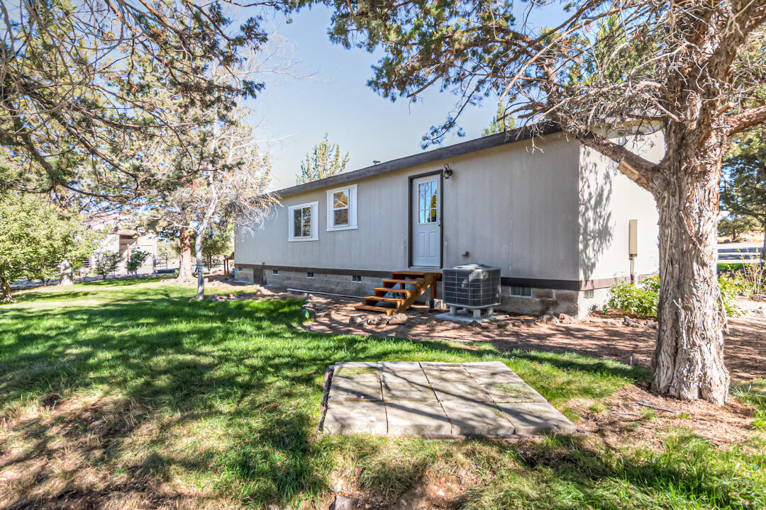14555 Southeast Crow Road Prineville, OR 97754 - Photo 7 of 29 rear of home is landscaped