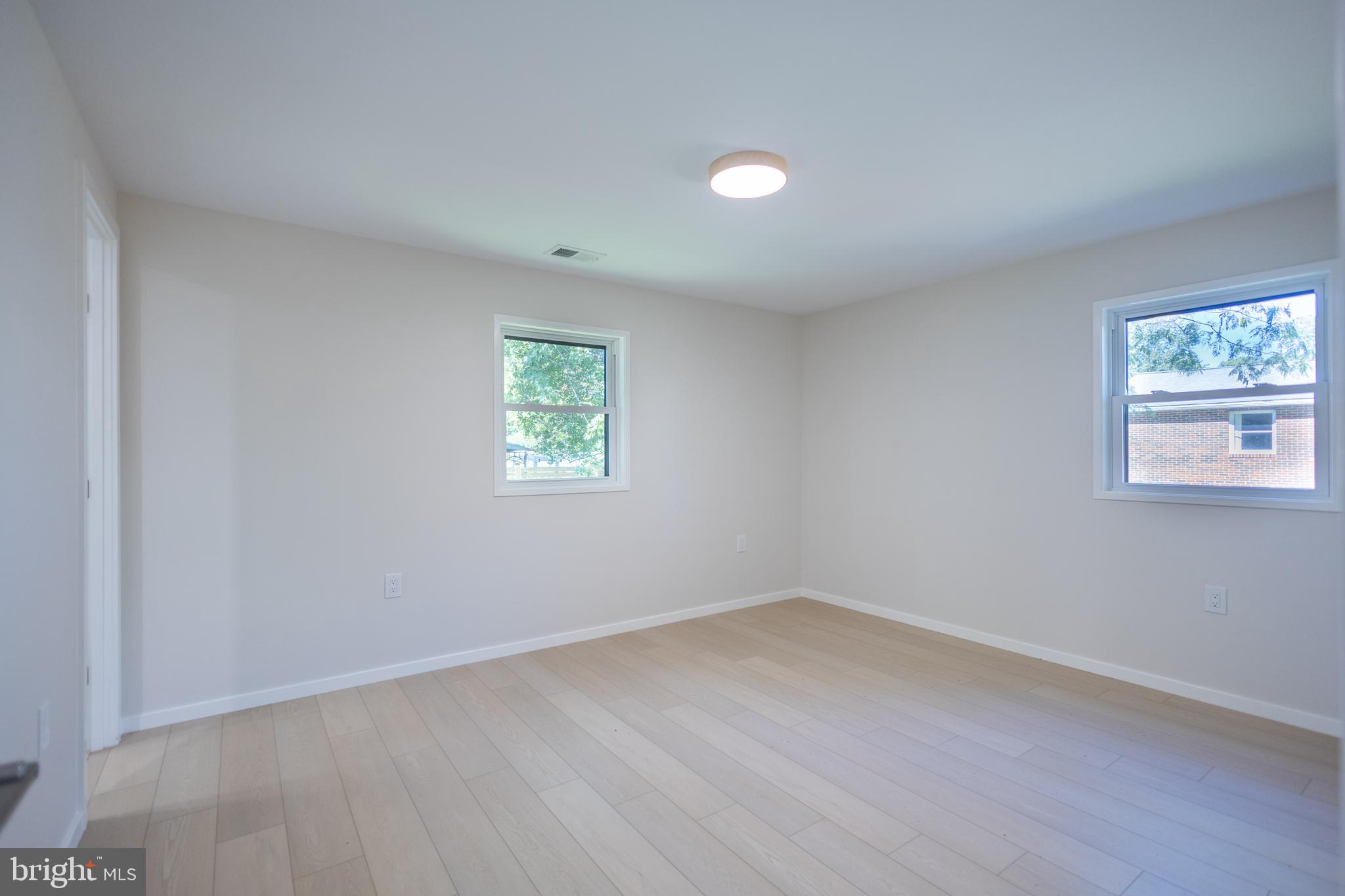 414 Venton Road Edgewater, MD 21037 - Photo 3 of 25 an empty room with a window