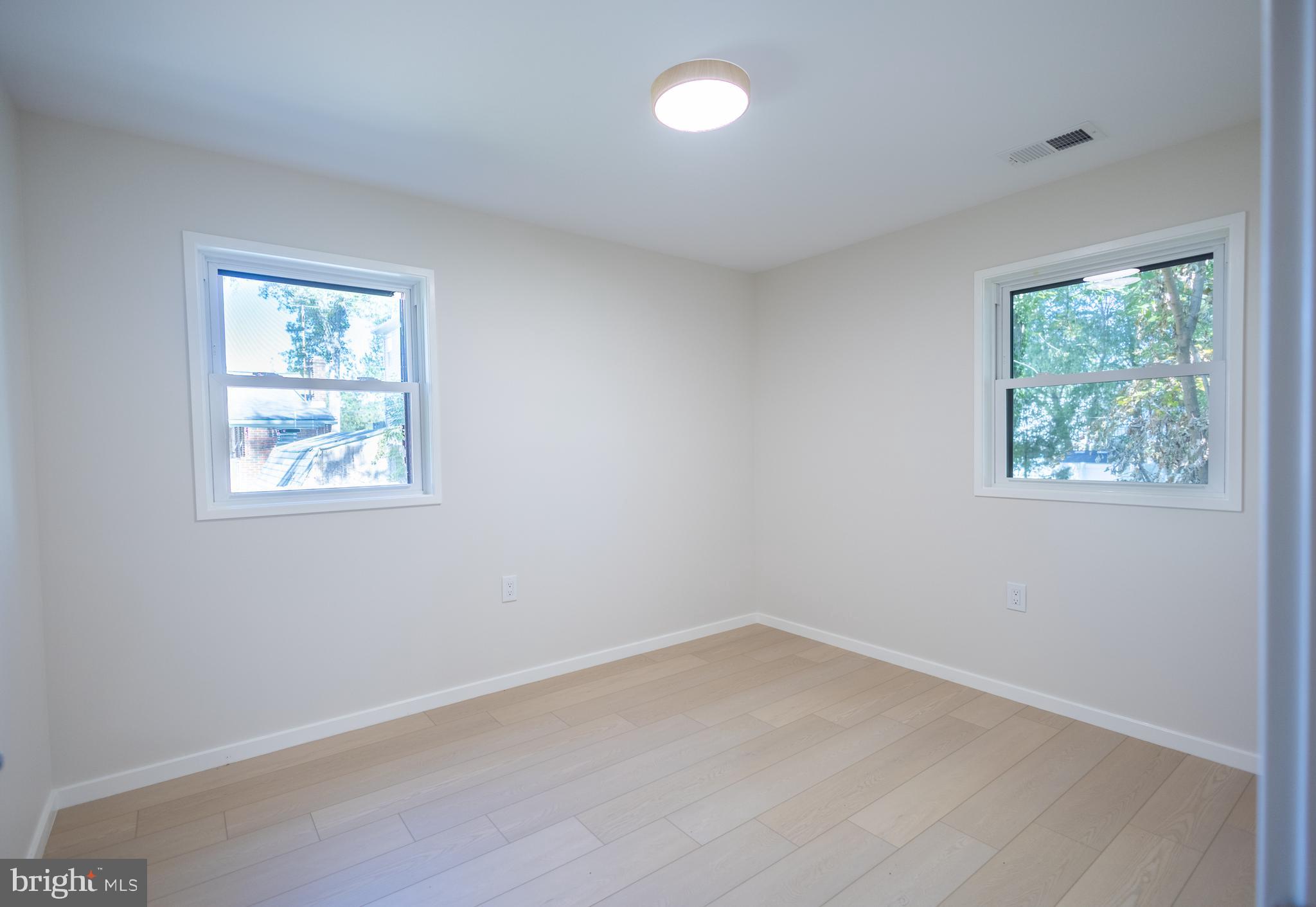 414 Venton Road Edgewater, MD 21037 - Photo 4 of 25 an empty room with a window