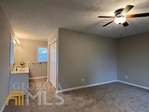 wooden floor in an empty room and a window