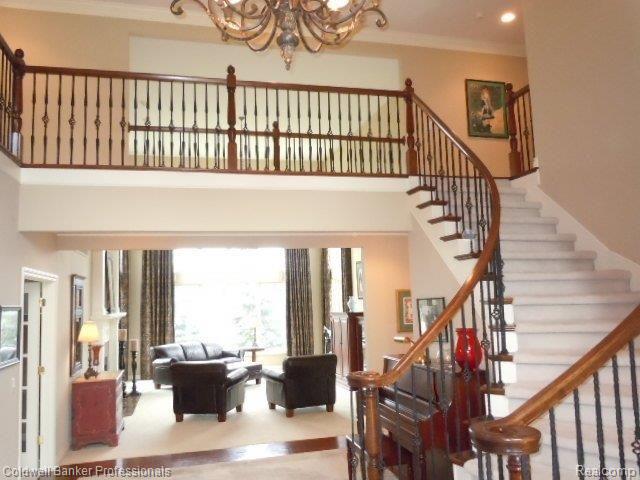 Bridge Overlooks Foyer and  Two 