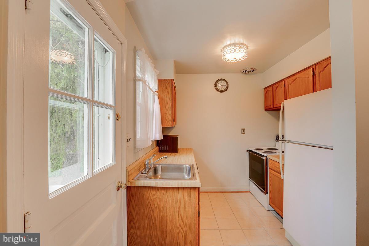 1022 Windsor Road Pikesville, MD 21208 - Photo 13 of 30 Kitchen bright new windows