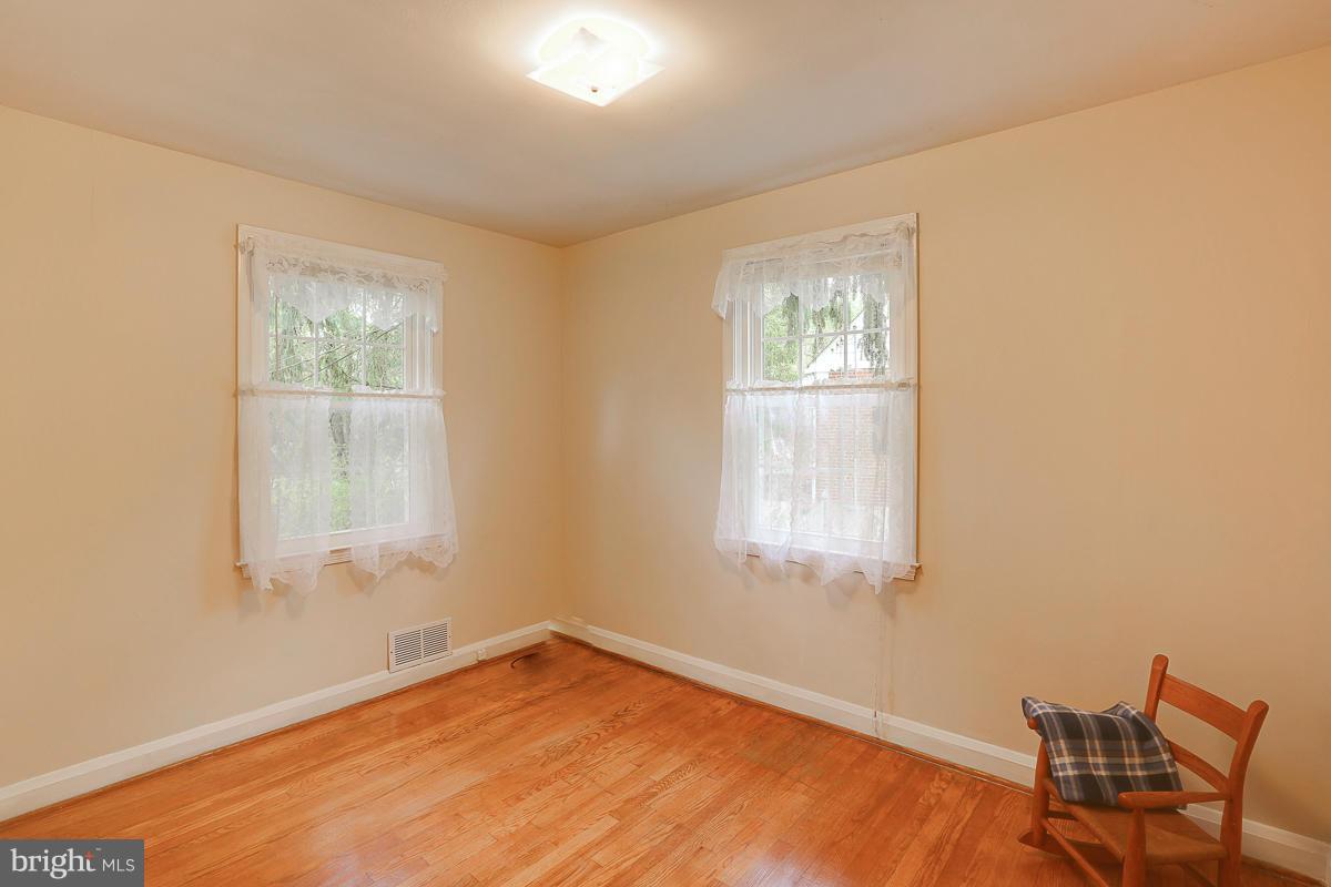 1022 Windsor Road Pikesville, MD 21208 - Photo 16 of 30 2nd bedroom hardwood floors