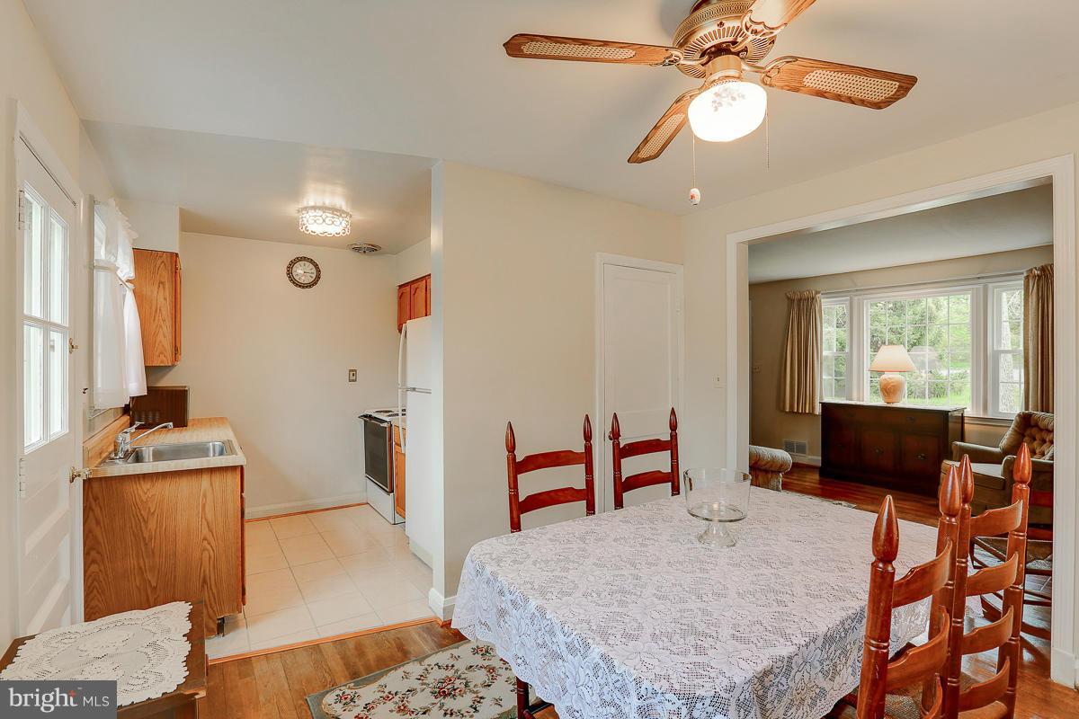1022 Windsor Road Pikesville, MD 21208 - Photo 9 of 30 Dining Room and kitchen