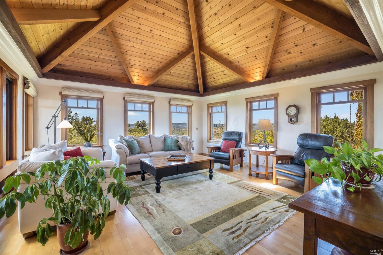 11007 Moonshine Road Sebastopol, CA 95472 - Photo 1 of 1 a living room with furniture and a large window