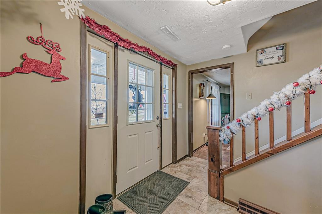 632 Hopewell Road White, PA 15490 - Photo 2 of 25 a view of an entryway with wooden floor