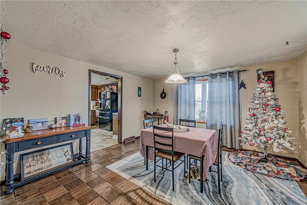 632 Hopewell Road White, PA 15490 - Photo 7 of 25 a dining room with furniture and window