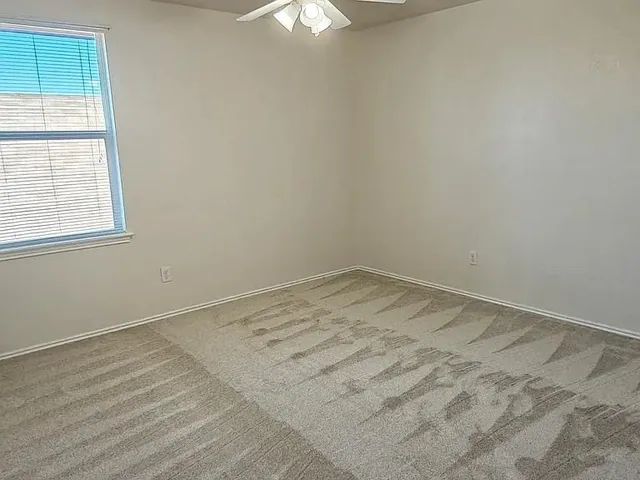 an empty room with a window