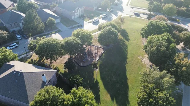 a view of a room with wooden walls