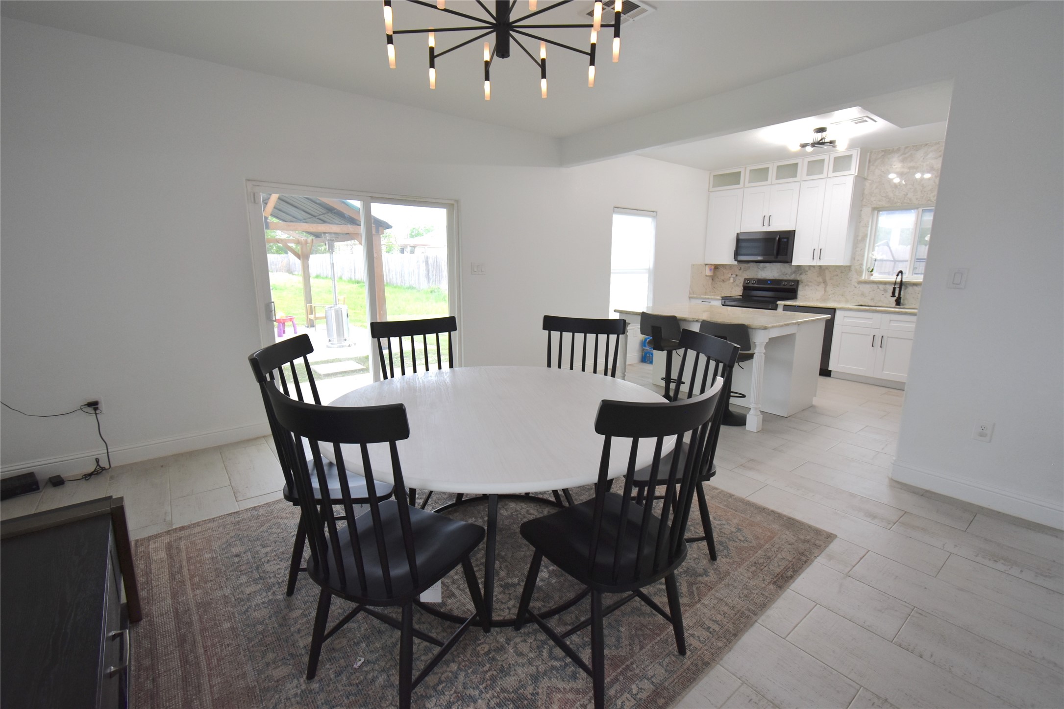 42 County Rd-5102L Cleveland, TX 77327 - Photo 7 of 9 a view of a dining room with furniture and a livingroom