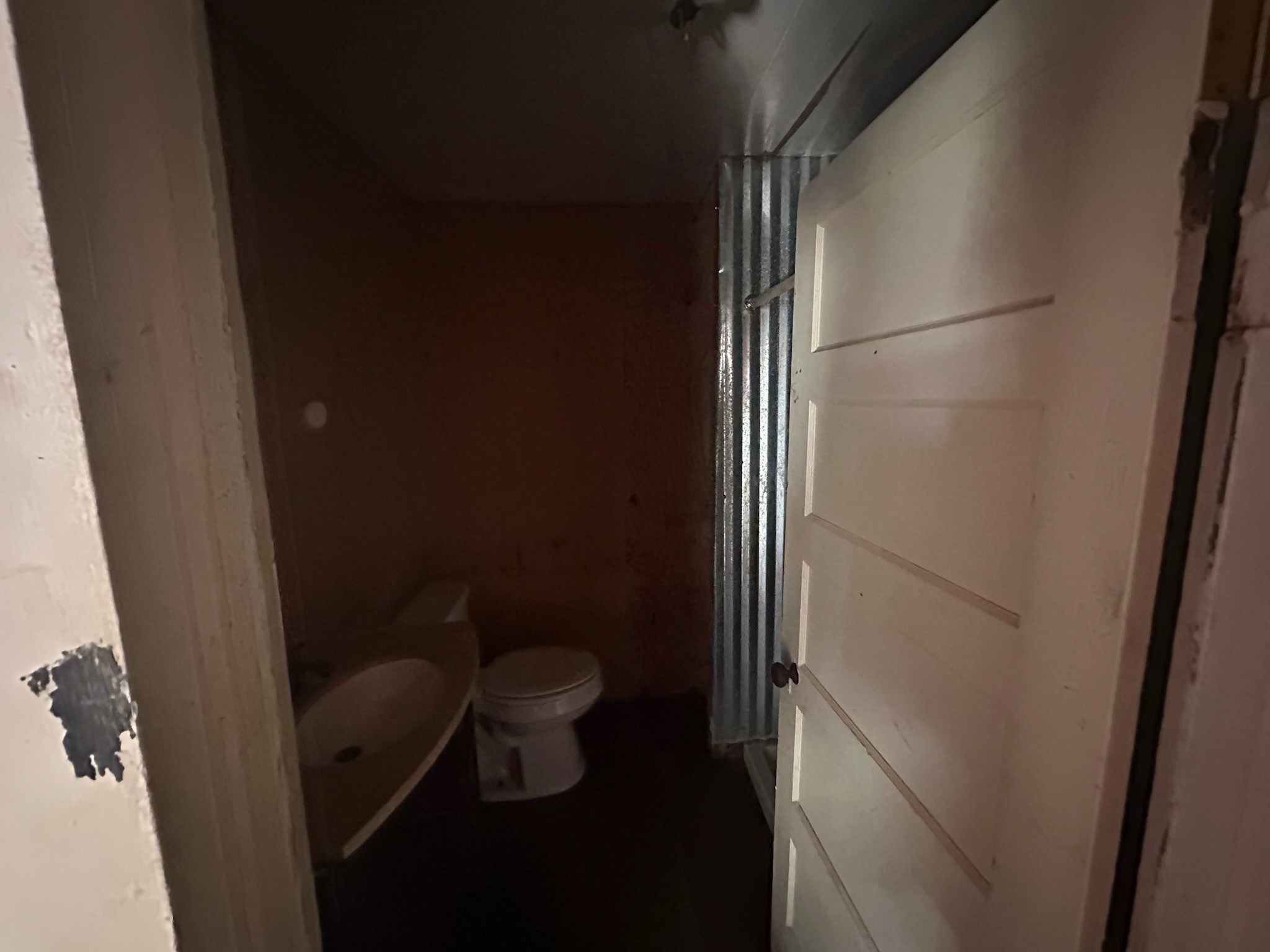 348 Walnut Street Donie, TX 75838 - Photo 9 of 12 a bathroom with a toilet