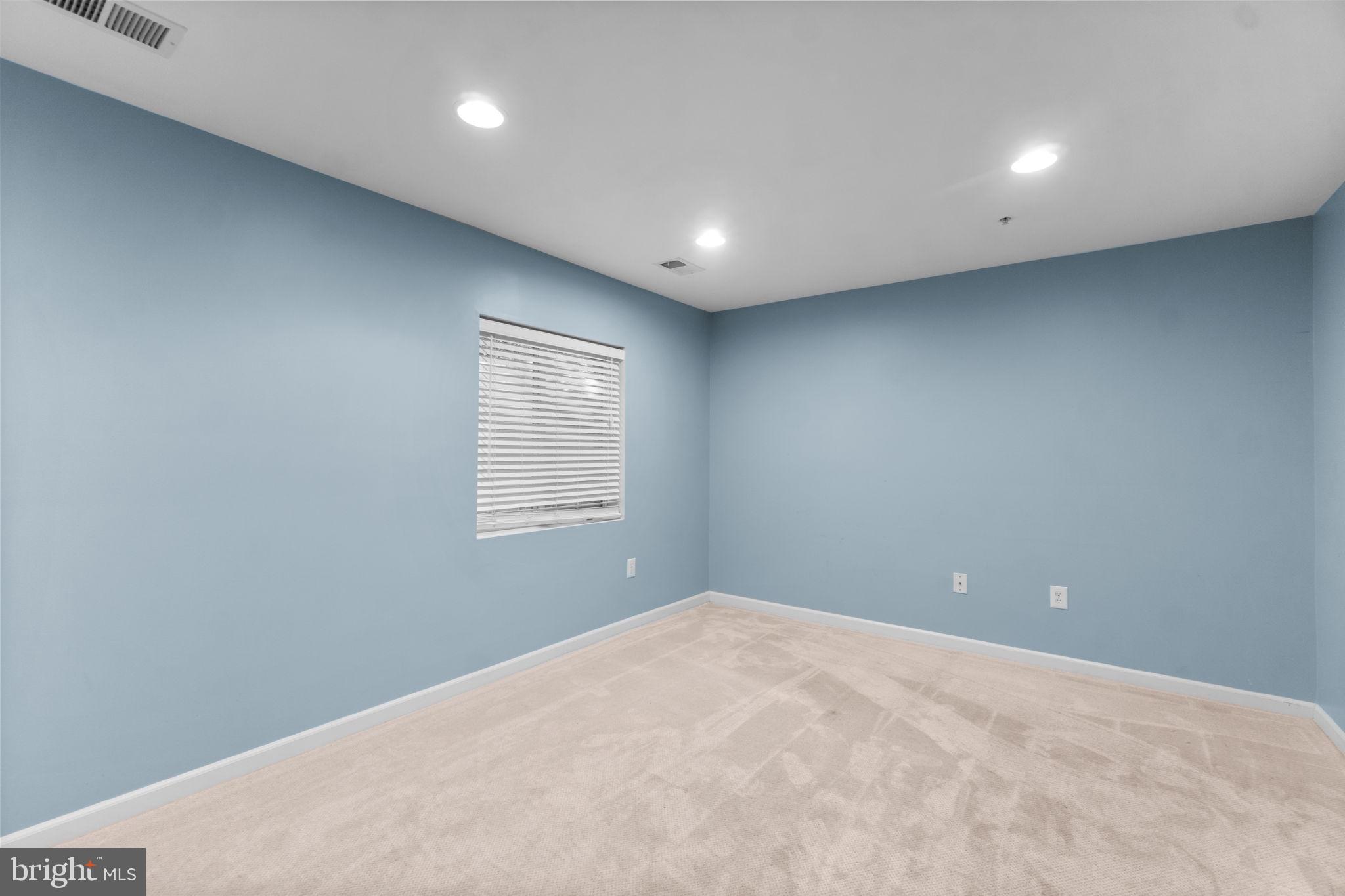 4814 Portsmouth Road, Unit 31 Ellicott City, MD 21042 - Photo 26 of 33 Lower Level Rec Room