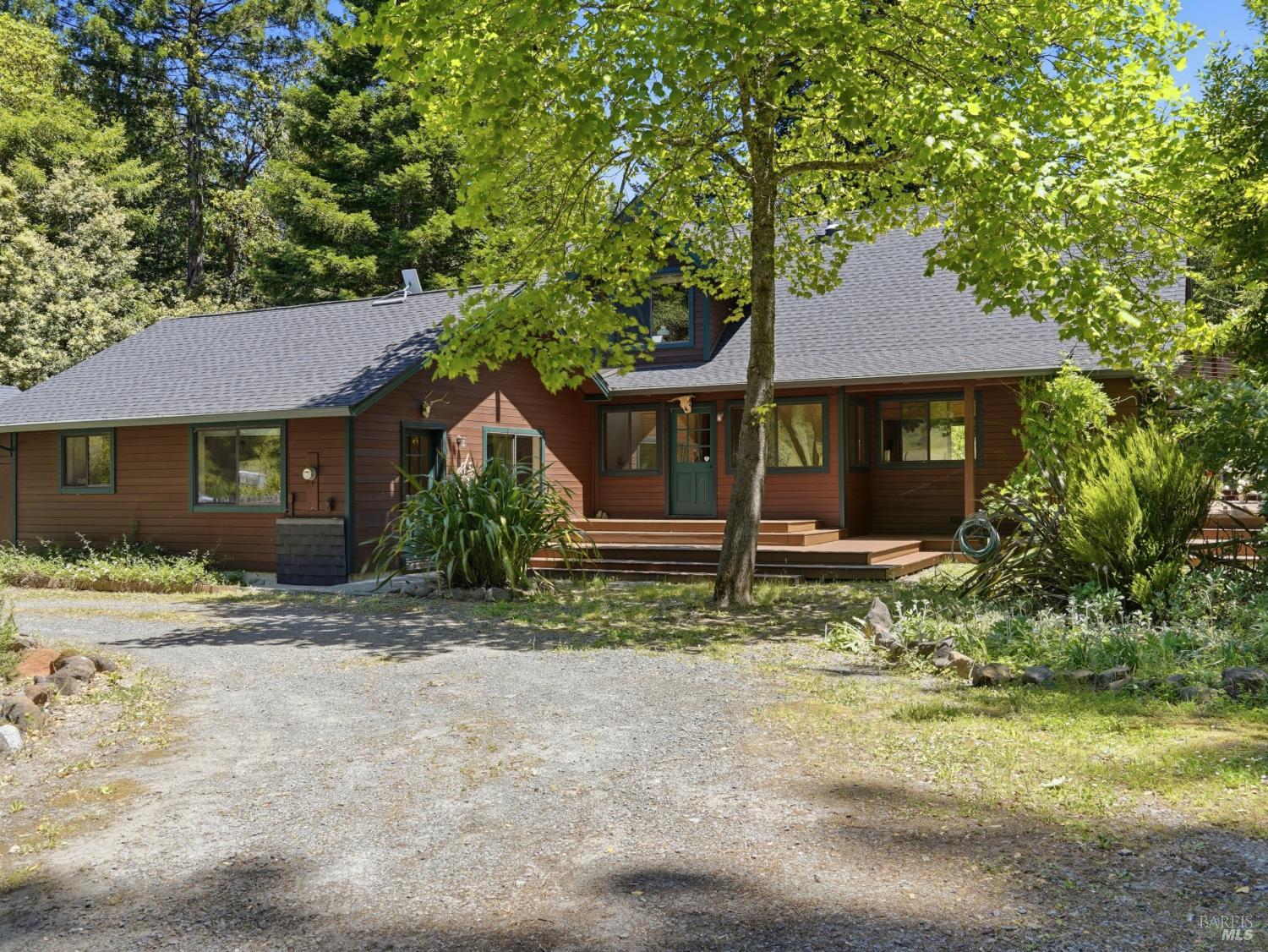 31397 Seaview Road Cazadero, CA 95421 - Photo 4 of 47 a house with a tree in front of it