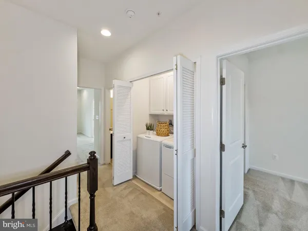 a very nice looking room with a big room and windows