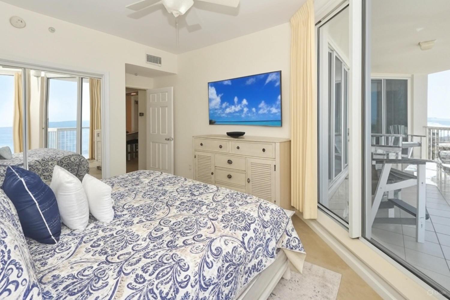 1050 Highway 98, Unit 905E Destin, FL 32541 - Photo 17 of 30 a bedroom with a bed and a view of bedroom