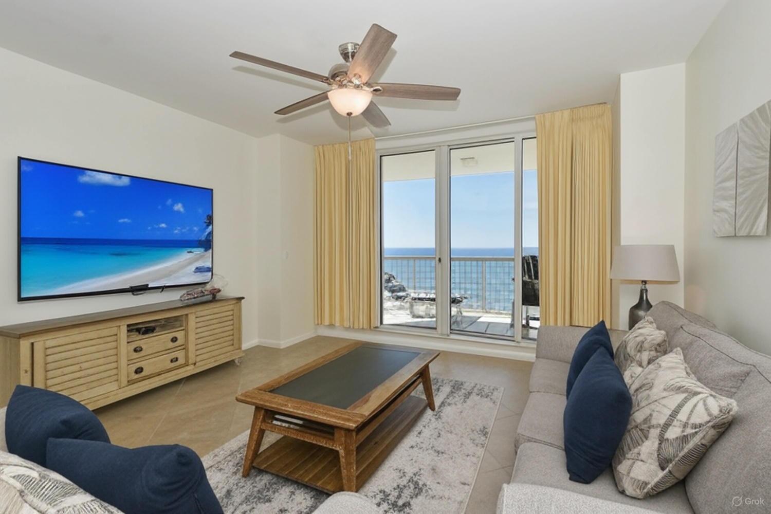 1050 Highway 98, Unit 905E Destin, FL 32541 - Photo 6 of 30 a living room with furniture and a flat screen tv