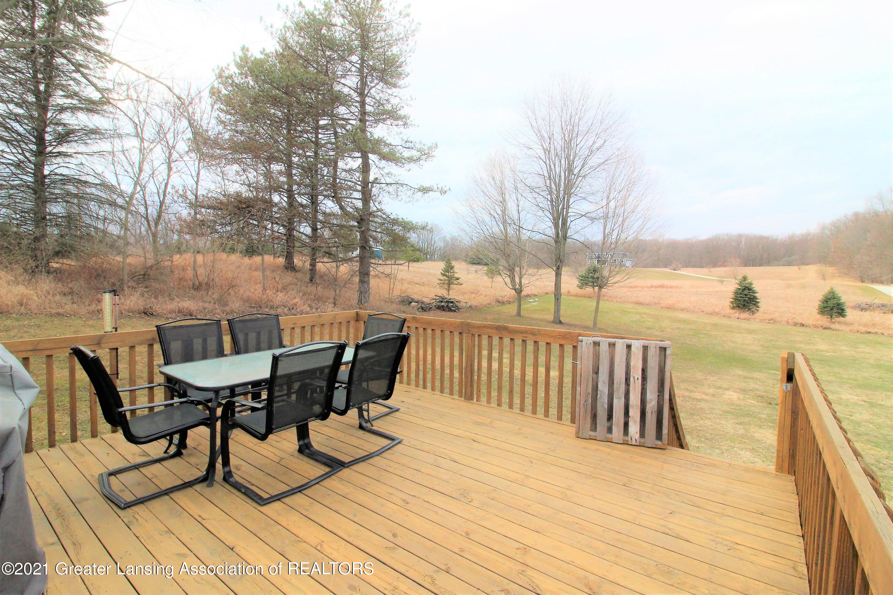 8370 West Howe Road Eagle, MI 48822 - Photo 5 of 45 deck 2