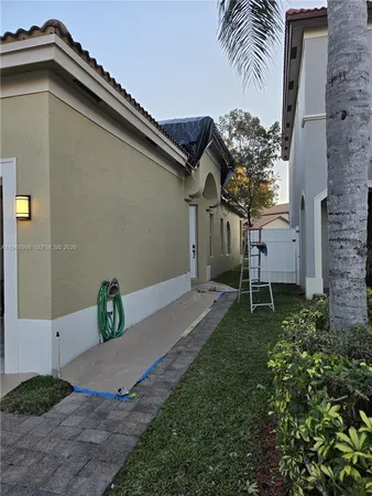 a backyard of a house with lots of green space