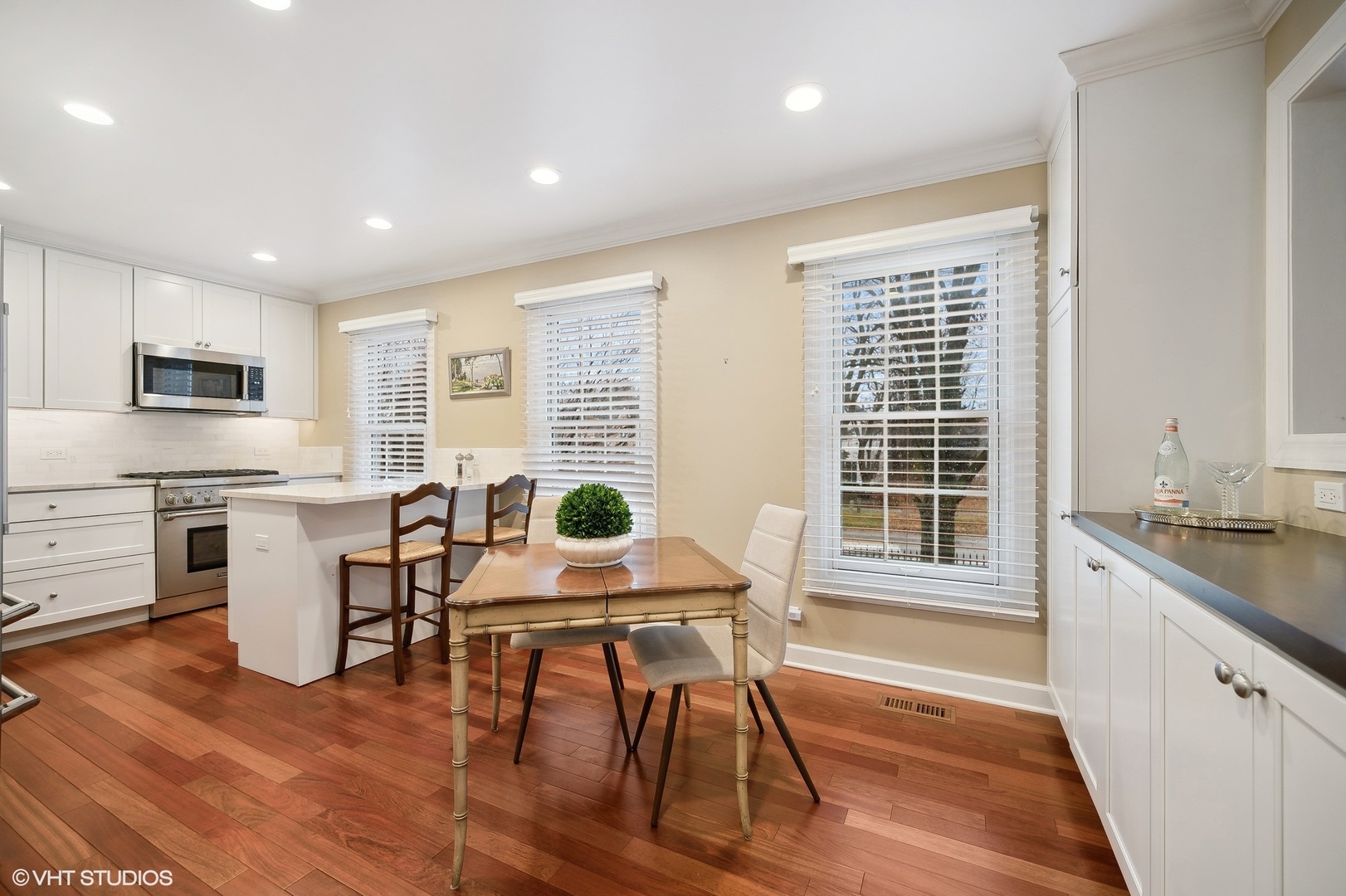 3 Landmark Street Northfield, IL 60093 - Photo 11 of 31 a view of a dining room with furniture window and wooden floor