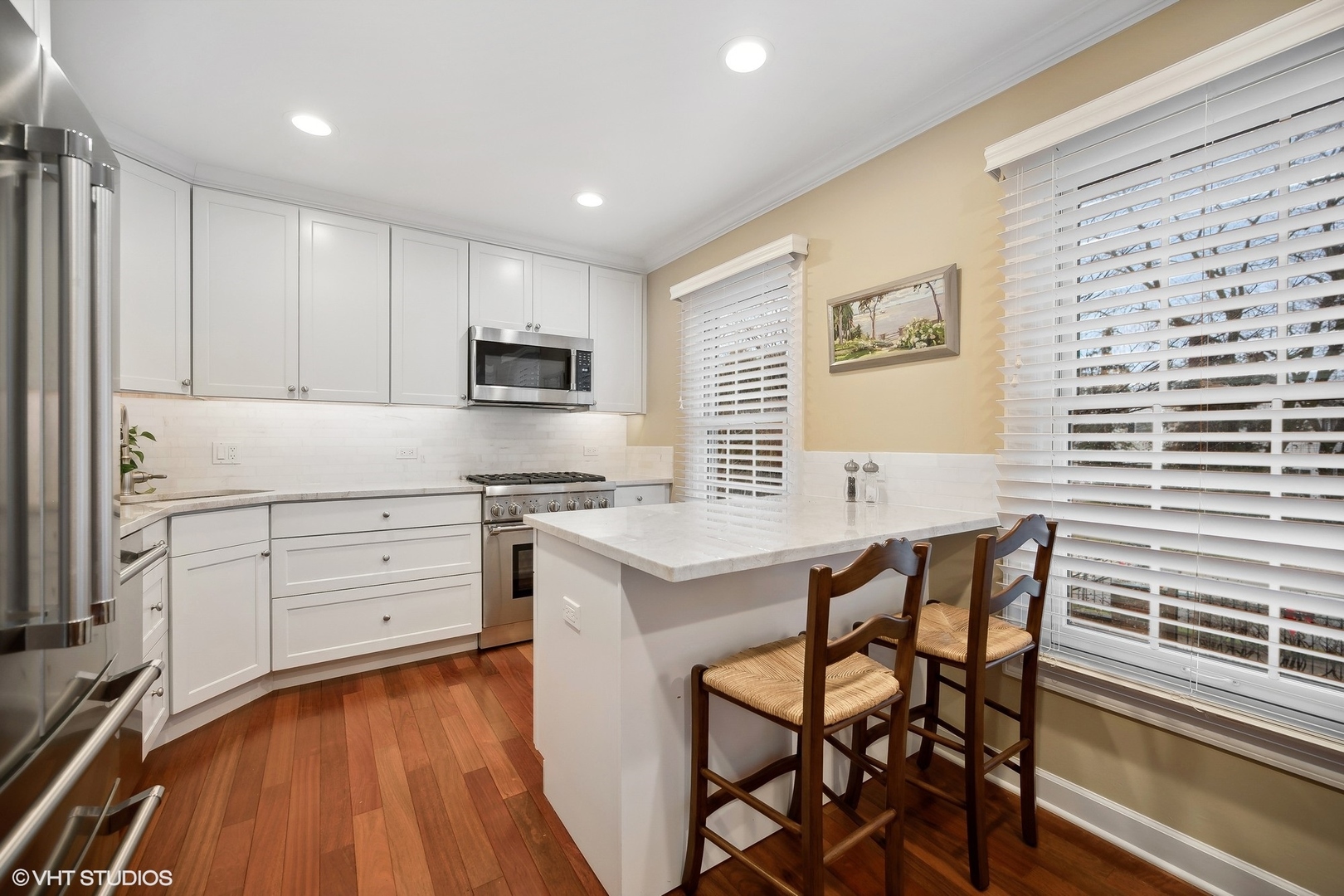 3 Landmark Street Northfield, IL 60093 - Photo 13 of 31 a kitchen with a stove a sink and a refrigerator