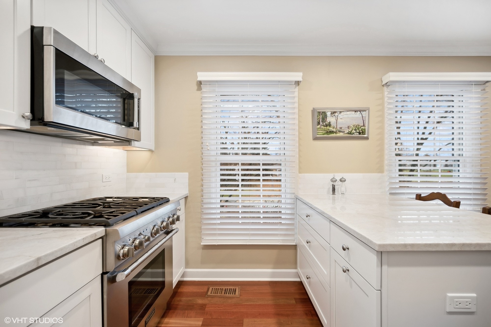 3 Landmark Street Northfield, IL 60093 - Photo 14 of 31 a kitchen with granite countertop cabinets stainless steel appliances and a window