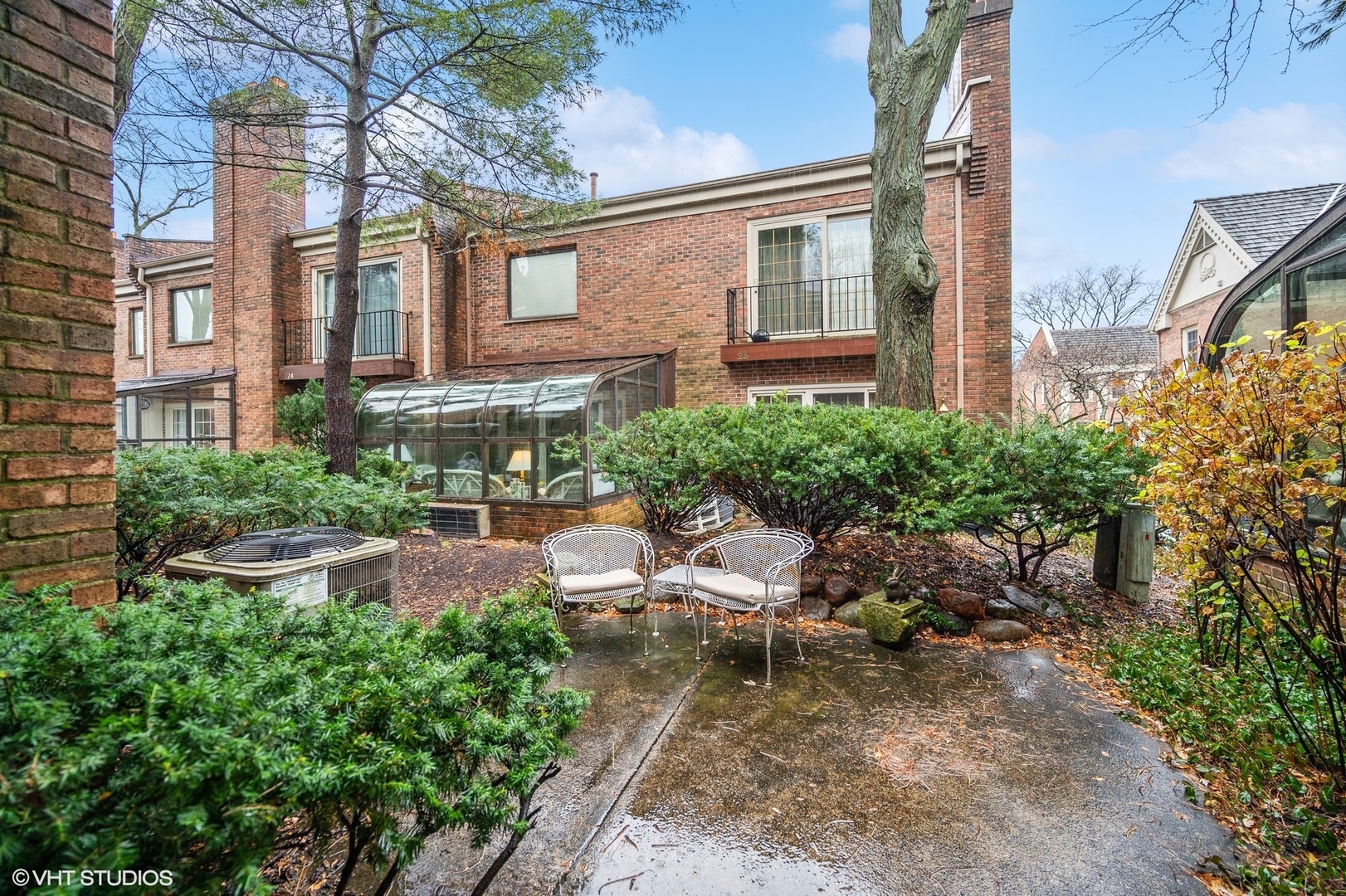 3 Landmark Street Northfield, IL 60093 - Photo 19 of 31 a view of backyard of house with outdoor seating and green space