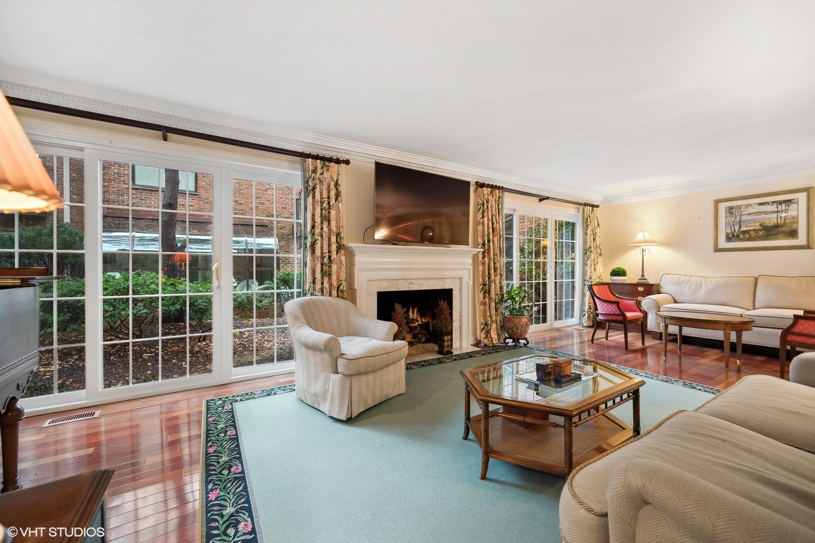 3 Landmark Street Northfield, IL 60093 - Photo 8 of 31 a living room with furniture and a fireplace