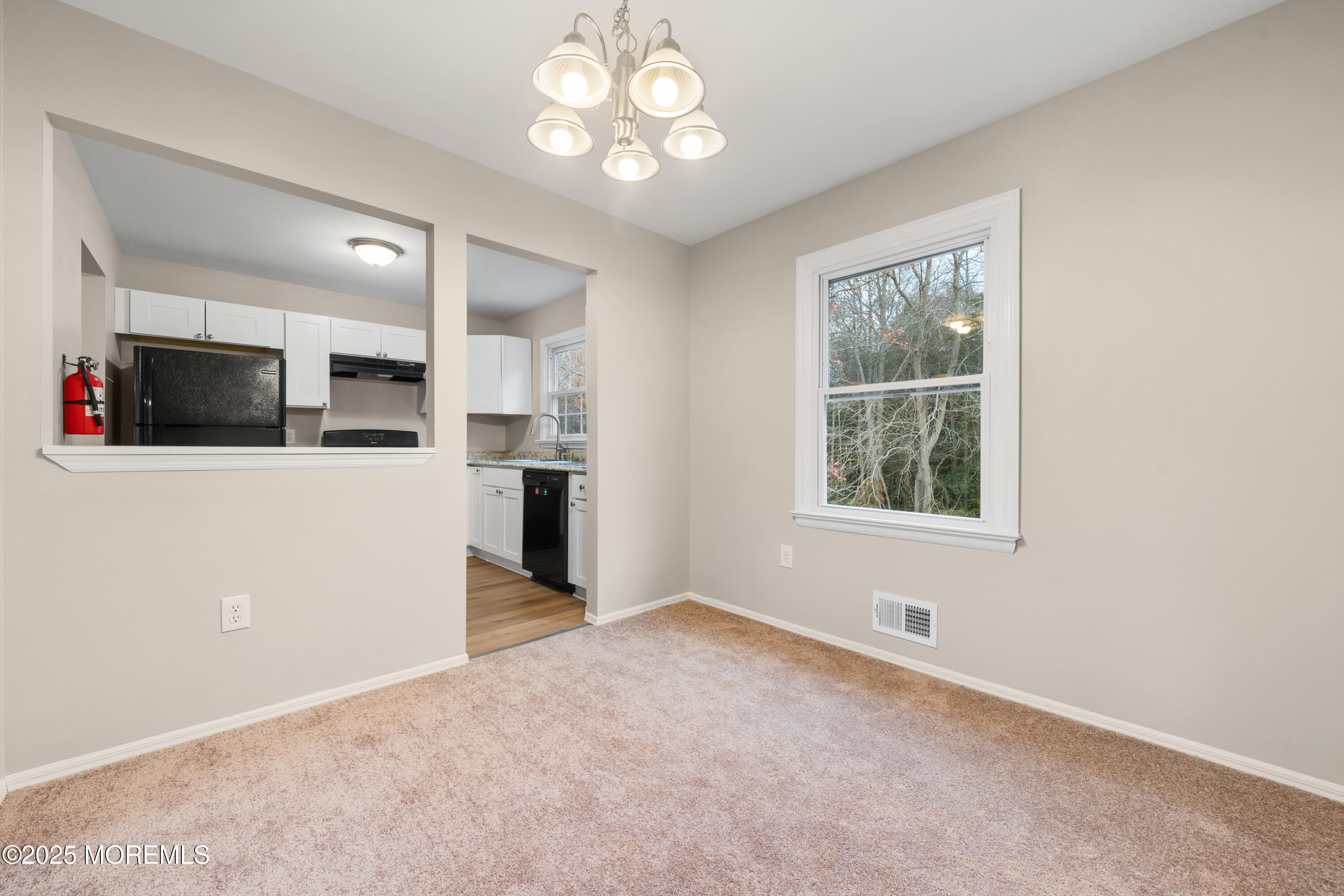 137 Red Bank Avenue Bayville, NJ 08721 - Photo 14 of 24 an empty room with windows and fireplace