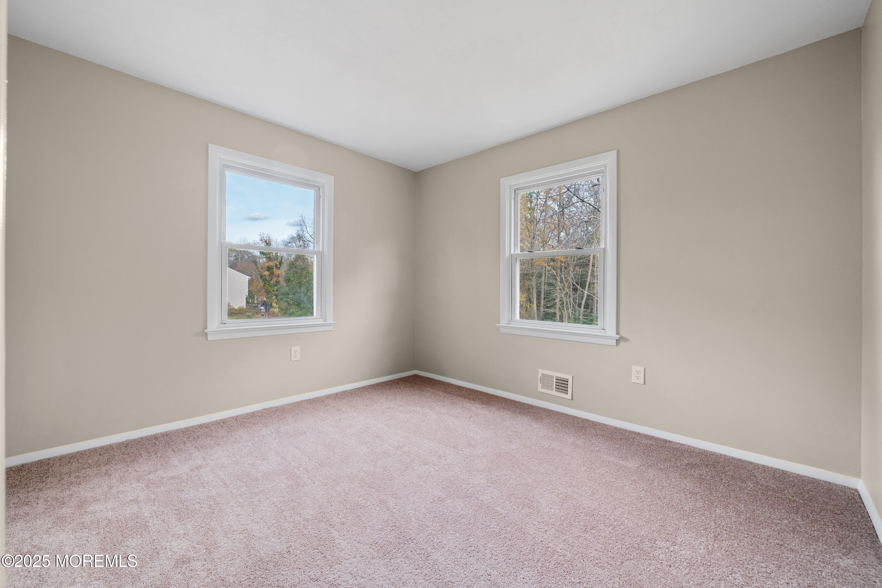 137 Red Bank Avenue Bayville, NJ 08721 - Photo 19 of 24 an empty room with a window
